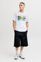 Front image of a model wearing the Indiana tee ss crew neck in white, by brand Jack&jones