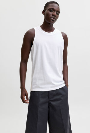 Front image of a model wearing the Sunset back print sleeveless tshirt in white, by brand Jack&jones