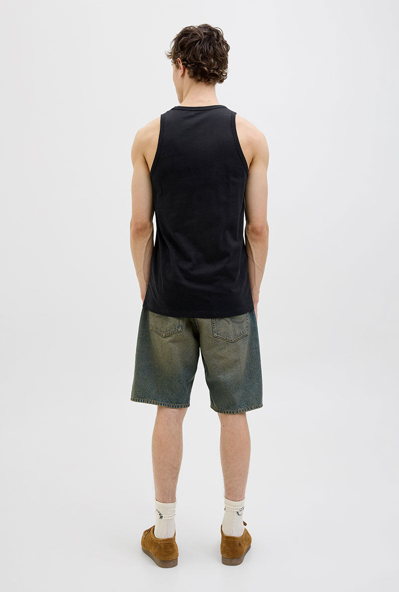 Back image of a model wearing Jack and jones hawaii pocket tanktop in black, by brand Jack&jones