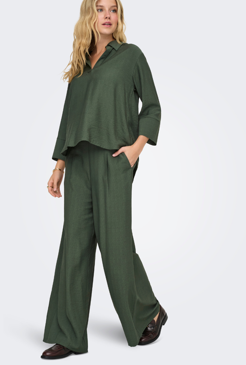 Front image of a model wearing Jdy pepper palazzo pants in olive, by brand Jacqueline de yong