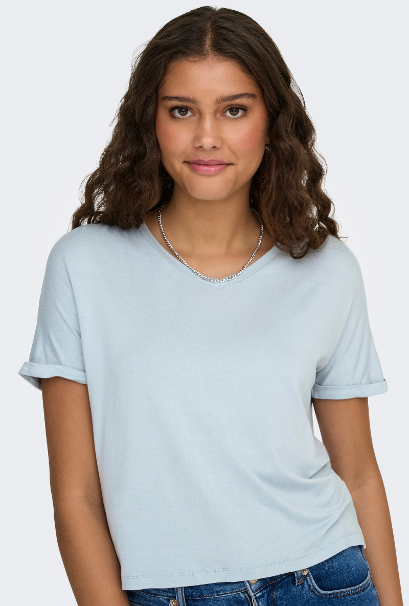 Front image of a model wearing Jdy sissy s/s vneck top in light blue, by brand Jacqueline de yong