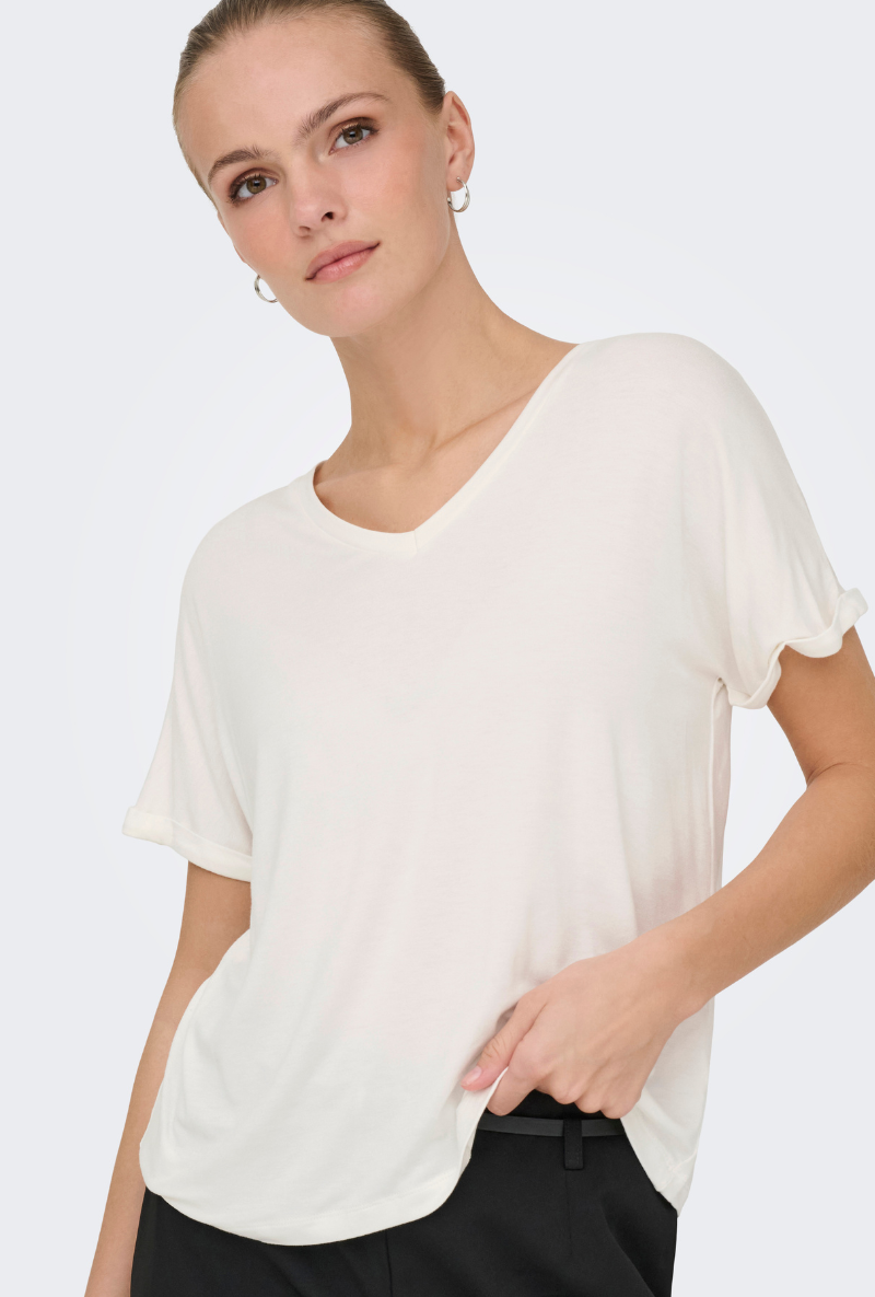 Front image of a model wearing Jdy sissy s/s vneck top in off white, by brand Jacqueline de yong