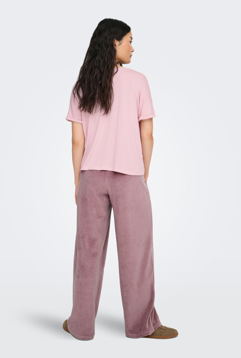 Back image of a model wearing Jdy sissy s/s vneck top in pink, by brand Jacqueline de yong