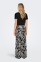 Back image of a model wearing the Jdy tami hw wide pants in black, by brand Jacqueline de yong