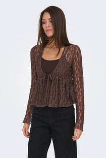 Front image of a model wearing the Laya lace cardigan in brown, by brand Only