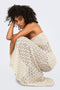 Front image of a model wearing the Laya lace long skirt in cream, by brand Only
