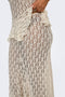 Side detail image of a model wearing the Laya lace long skirt in cream, by brand Only
