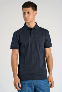 Front image of a model wearing the Needle drop s/s polo in navy, by brand Lindbergh