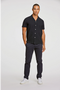 Front image of a model wearing the Casual linen blend resort shirt in black, by brand Lindbergh