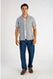Front image of a model wearing the Cotton structure s/s shirt in grey, by brand Lindbergh