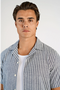 Front image of a model wearing the Cotton structure s/s shirt in grey, by brand Lindbergh