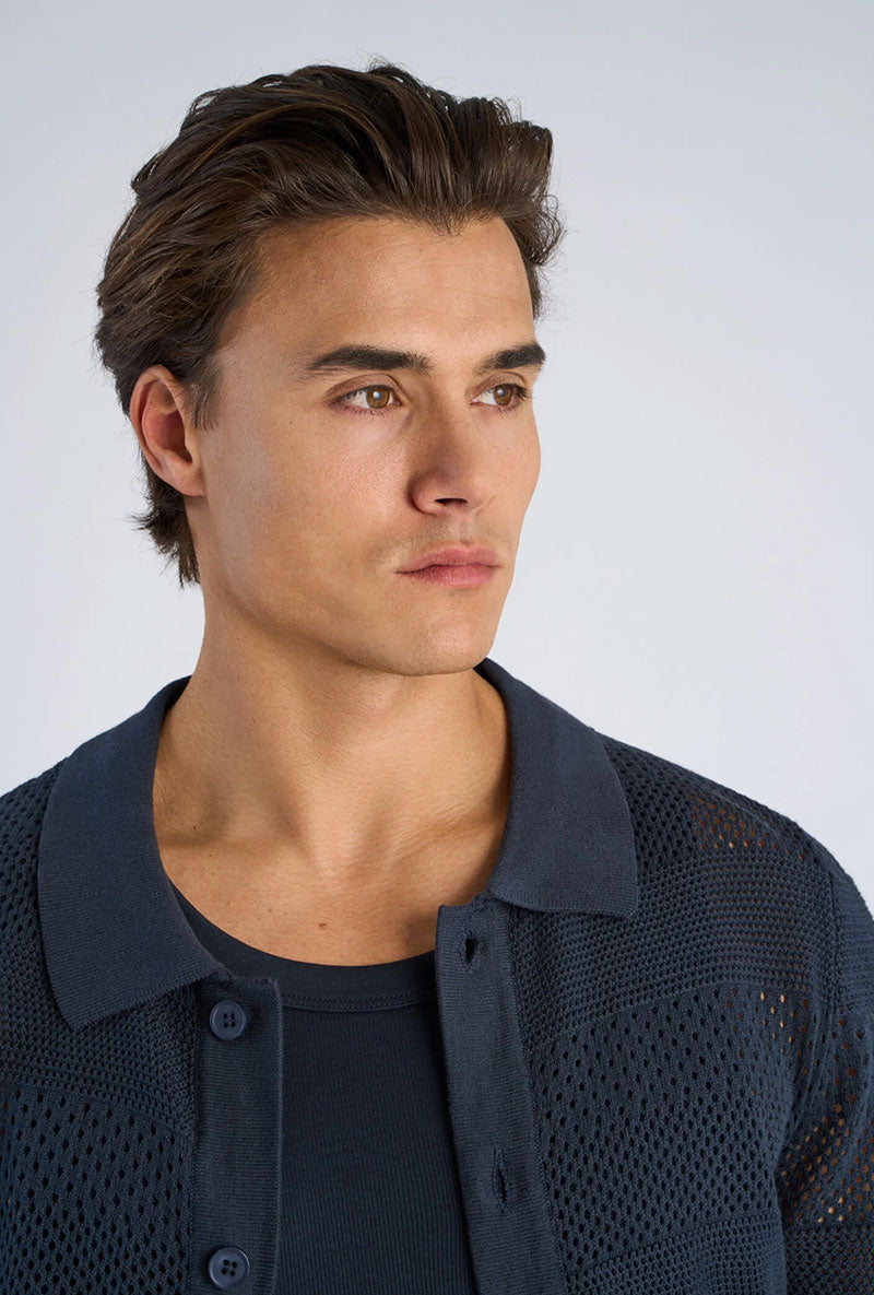 Front close up image of a model wearing Crochet s/s shirt in navy, by brand Lindbergh