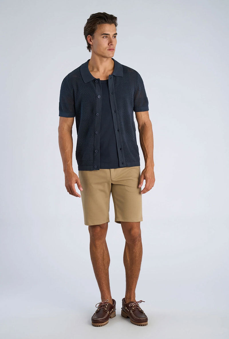 Front image of a model wearing Crochet s/s shirt in navy, by brand Lindbergh