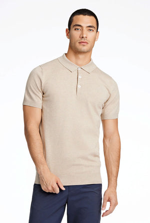 Front image of a model wearing the Ecovero s/s knit polo in sand, by brand Lindbergh
