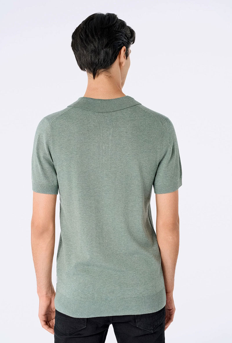 Back image of a model wearing Ecovero s/s knit polo in light green, by brand Lindbergh