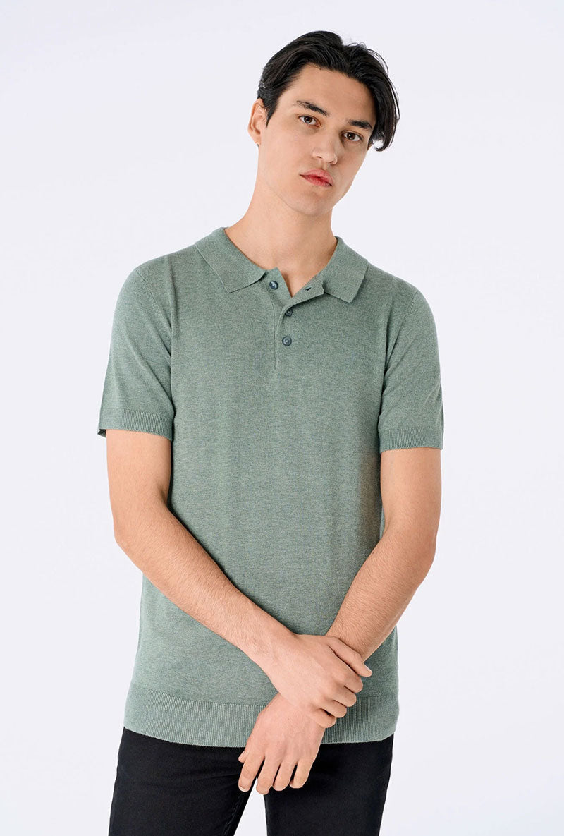 Front image of a model wearing Ecovero s/s knit polo in light green, by brand Lindbergh