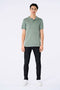 Front image of a model wearing the Ecovero s/s knit polo in light green, by brand Lindbergh