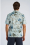 Back image of a model wearing the Floral lyocell blend shirt in aqua, by brand Lindbergh