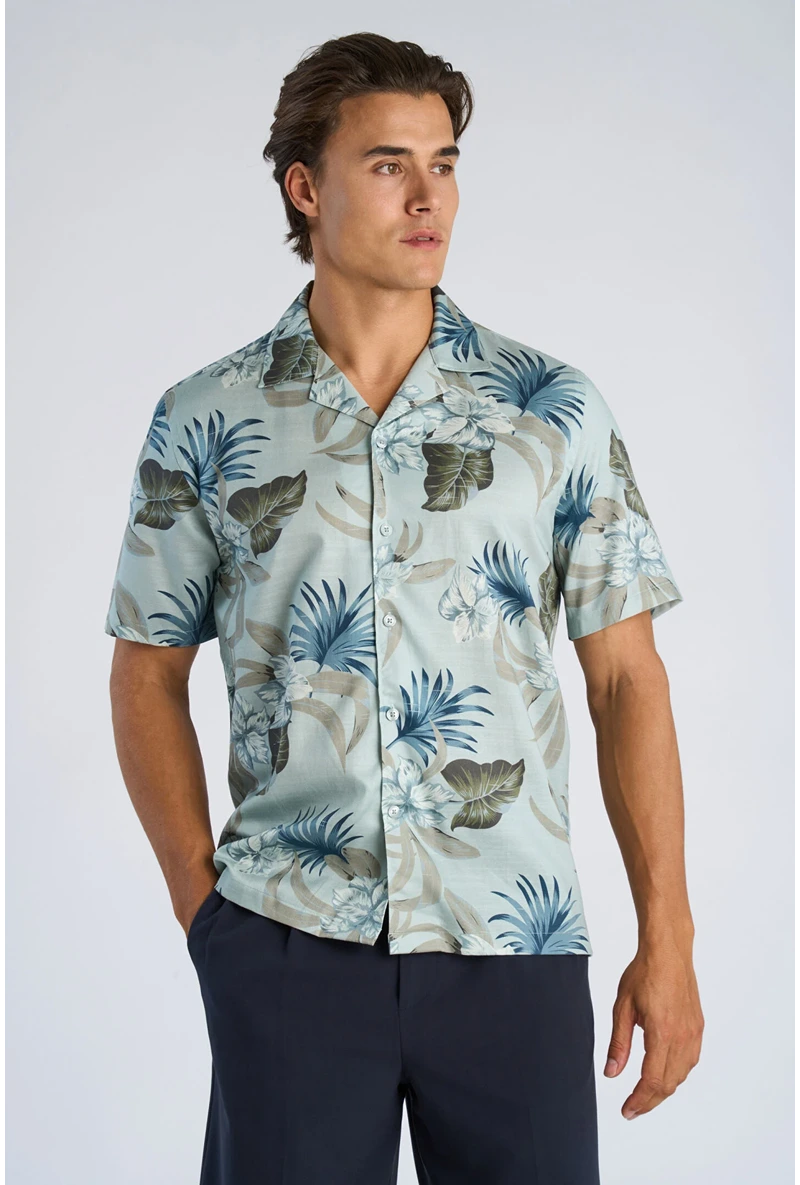 Front image of a model wearing Floral lyocell blend shirt in aqua, by brand Lindbergh
