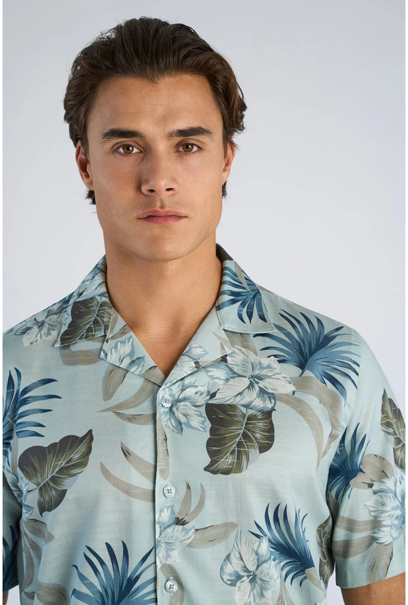 Front image of a model wearing Floral lyocell blend shirt in aqua, by brand Lindbergh