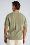 Back image of a model wearing the Knitted s/s polo in light green, by brand Lindbergh