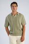 Front image of a model wearing Knitted s/s polo in light green, by brand Lindbergh