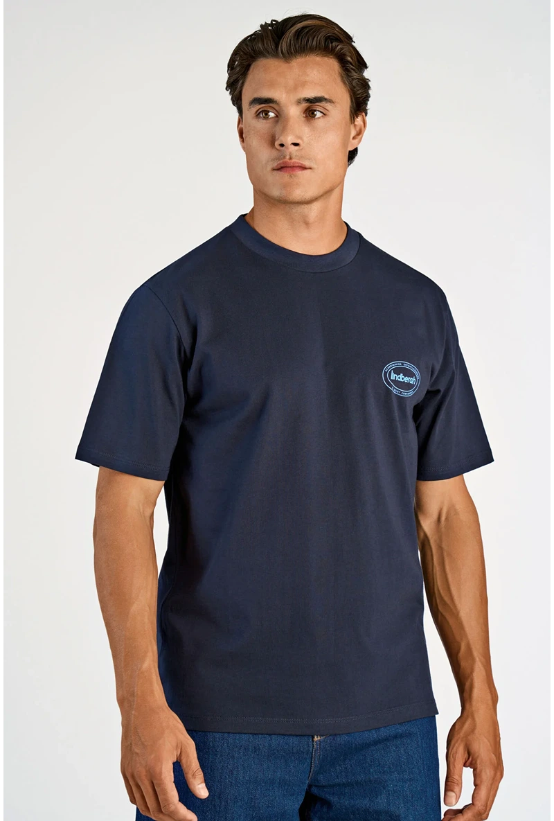 Front image of a model wearing Lemon squeezy oversize t in navy, by brand Lindbergh