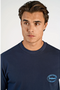 Front image of a model wearing the Lemon squeezy oversize t in navy, by brand Lindbergh