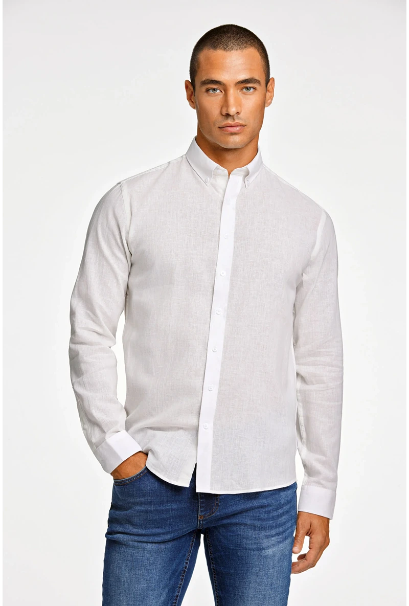 Front image of a model wearing Linen/cotton ls shirt in white, by brand Lindbergh