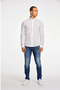 Front image of a model wearing the Linen/cotton ls shirt in white, by brand Lindbergh