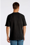 Back image of a model wearing the Oversized s/s t in black, by brand Lindbergh