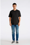 Front image of a model wearing the Oversized s/s t in black, by brand Lindbergh