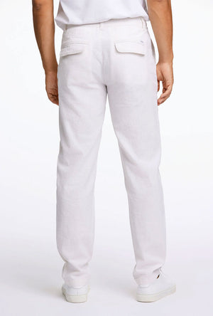 Back image of a model wearing the Relaxed fit linen trousers in white, by brand Lindbergh