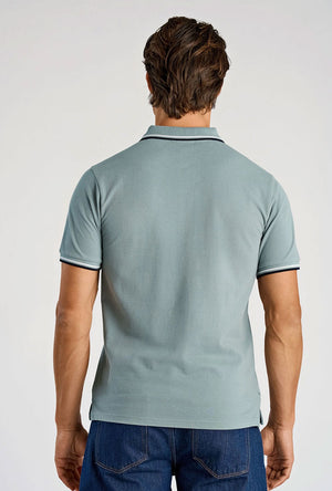 Back image of a model wearing the S/s contrast polo in aqua, by brand Lindbergh