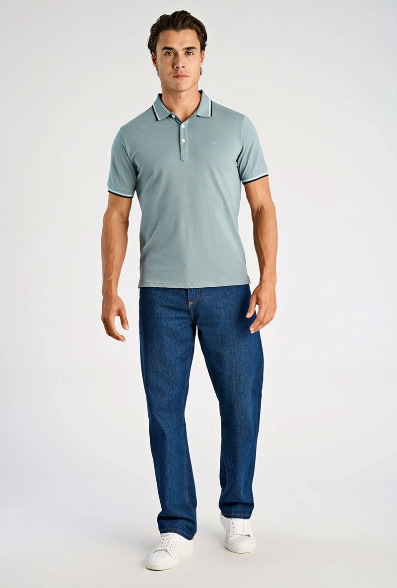 Front image of a model wearing S/s contrast polo in aqua, by brand Lindbergh