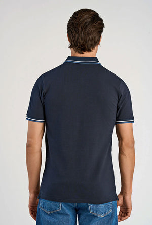 Back image of a model wearing the S/s contrast polo in navy, by brand Lindbergh