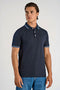 Front image of a model wearing S/s contrast polo in navy, by brand Lindbergh