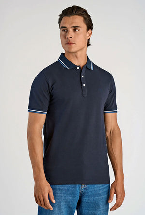 Front image of a model wearing the S/s contrast polo in navy, by brand Lindbergh