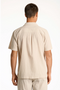 Back image of a model wearing the Seersucker s/s shirt in beige, by brand Lindbergh