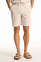 Front image of a model wearing Seersucker shorts in beige, by brand Lindbergh