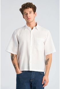 Front image of a model wearing the Solid dobby s/s shirt in white, by brand Lindbergh