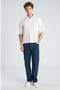Front image of a model wearing the Solid dobby s/s shirt in white, by brand Lindbergh