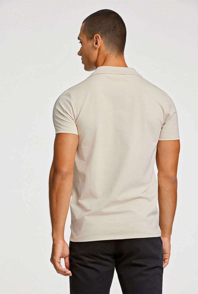 Back image of a model wearing Stretch s/s polo shirt in stone, by brand Lindbergh