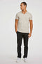 Front image of a model wearing the Stretch s/s polo shirt in stone, by brand Lindbergh