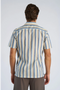 Back image of a model wearing the Striped s/s shirt in blue, by brand Lindbergh