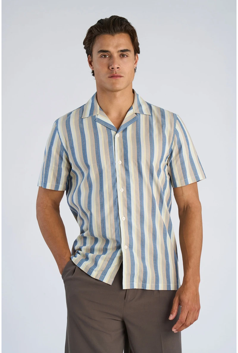 Front image of a model wearing Striped s/s shirt in blue, by brand Lindbergh