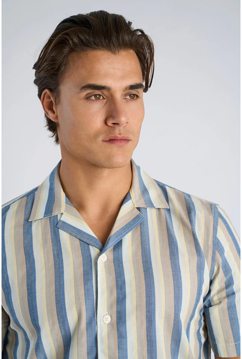Front image of a model wearing Striped s/s shirt in blue, by brand Lindbergh