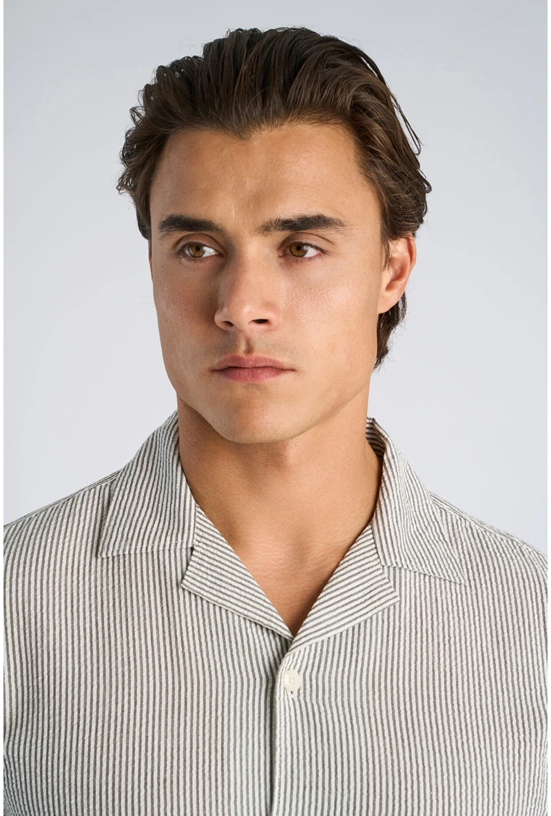 Front image of a model wearing Striped seersucker shirt in stripe, by brand Lindbergh