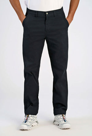 Front image of a model wearing the Superflex relaxed fit chino pants in black, by brand Lindbergh