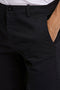 Front detail image of a model wearing the Superflex relaxed fit chino shorts in black, by brand Lindbergh
